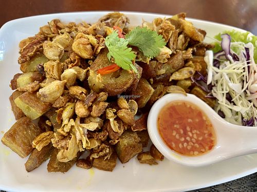 Vegan pork with tumaric  at Ruan Mae Lui Vegetarian เรือนแม่หลุยมังสวิรัติ in Bangkok