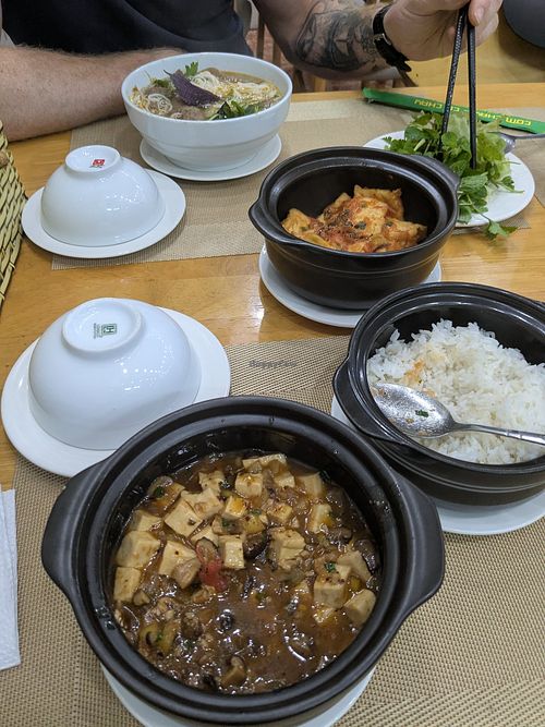 Szechuan tofu, tofu in tomato sauce and Hue noodle soup at Nhà Hàng Chay Hoa Lư - Loving Hut in Ninh Binh