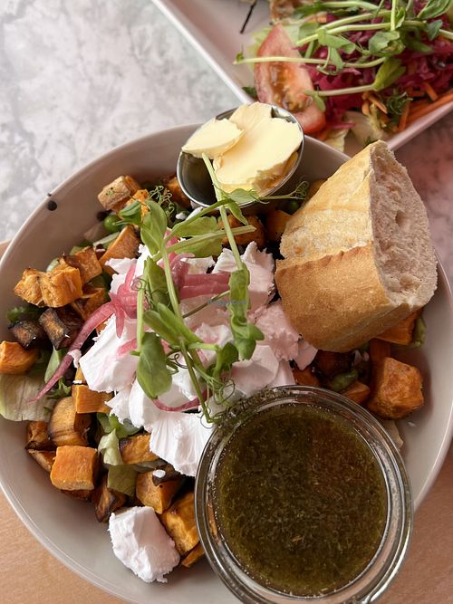Baked potato salad with vegan feta cheese  at Café Blå Katten in Mariefred