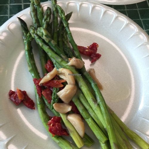 Asparagus with sun-dried tomatoes and garlic  at The S and S Takeout in Fort Pierce