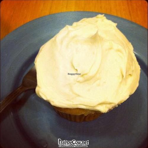 coconut cupcake with caramel frosting. at Susty's Cafe in Northwood