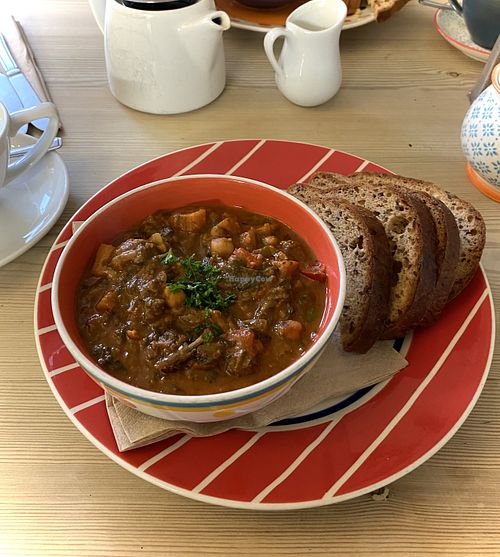 Sweet potato, pepper and peanut soup ❤️🧡💛  at Toucan Cafe in Minehead