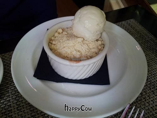 This is an incredible strawberry rhubarb cobbler with vegan ice cream. DELICIOUS!  at Candle Cafe West in New York City