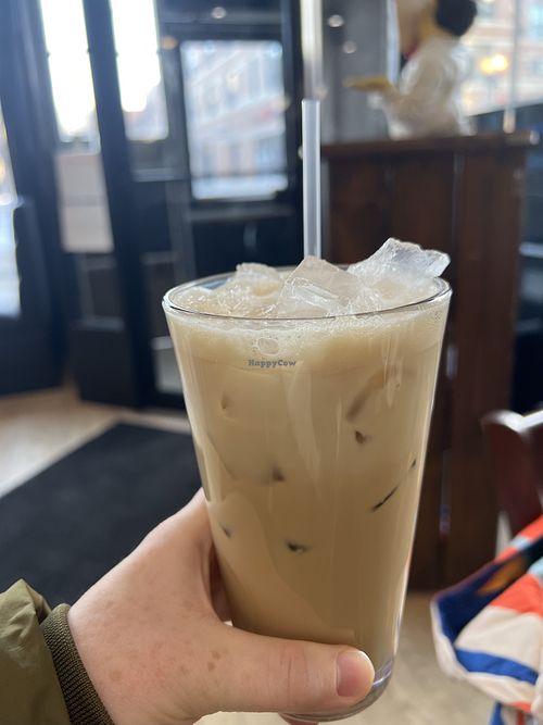 Iced chai latte with oat milk — syrup is vegan in of January 2026, modified with oat or almond.   at Breakfast House in Chicago