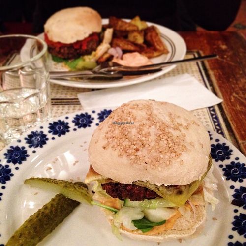 Two of three new vegan burgers. Very tasty and great value (50 SEK)! Extras such as potato wedges and coleslaw are 20 SEK each. Love this place!! at Kafe 44 in Stockholm