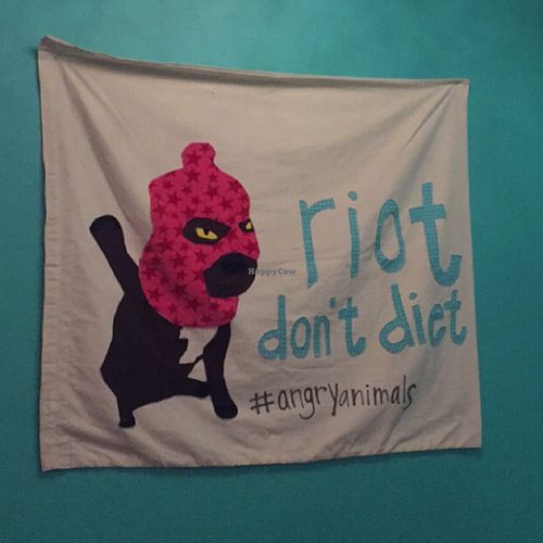 local art on walls at Kafe 44 in Stockholm