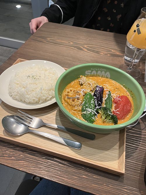 Coconut base curry with vegetables and rice  at Sama in Tokyo