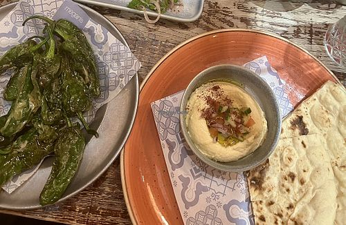 Padron peppers, hummus and flatbreadd  at Megan's in the Village in South West London