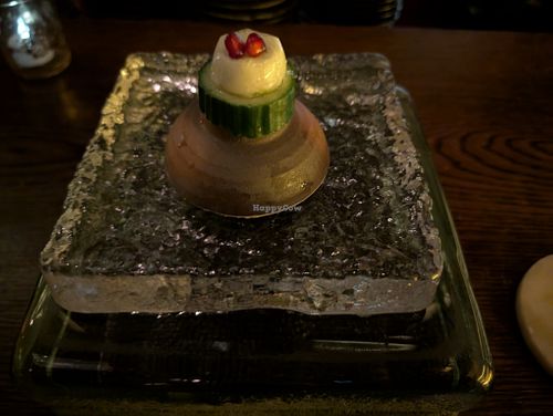 1 - Coconut Ceviche - 
Coconut Cream, Mint, Scallions, Red Thai Chili Pepper, Yuzu Juice, Pomegranate Seeds 
 at Omakaseed in New York City