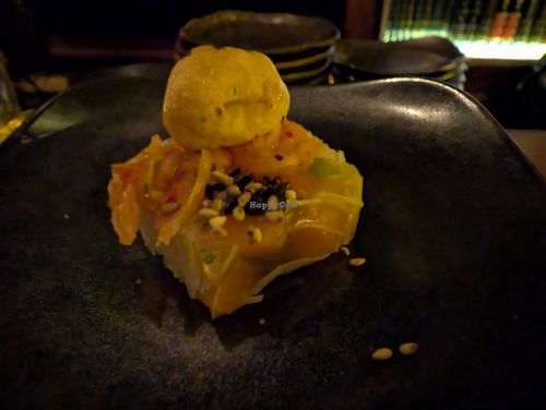 5 - Ramen Kanten - 
Fried Vermicelli, Dashi Kanten Broth, Corn, Peas, Carrot, Gat-Kimchi, Caramelized Lotus Seed, Marigold
 at Omakaseed in New York City