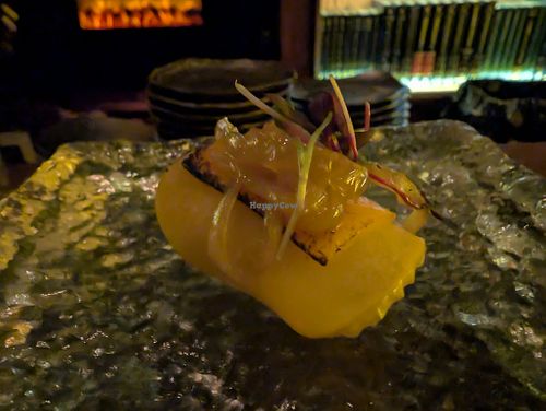 11 - Apple & Cheddar - 
Braised Apple, Glazed Onion, Cheese Crisp, Chives, Maple Thyme Shoyu
 at Omakaseed in New York City