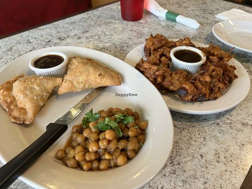 Vegan samosas and pakoras with tamarind sauce.  at Shyans's Kitchen in Metairie