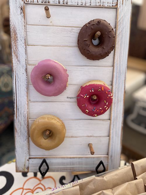 Doughnuts! (Chocolate, maple, pink sprinkle and seasonal flavor)  at SunOven Gluten Free Bakery in Ojai