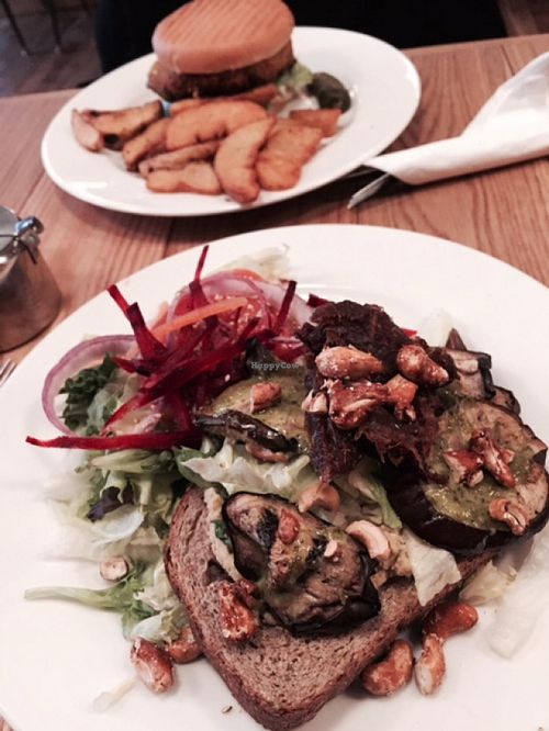 The Vegan Toast under This & That on the menu - wasabi sauce and beetroot chutney with cashews. And that's the veggie burger in the background. at The Laundromat Cafe in Reykjavik