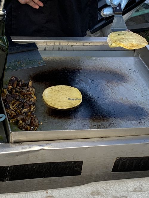 Preparing marinated white mushroom tacos  at hippiestacos in Long Beach