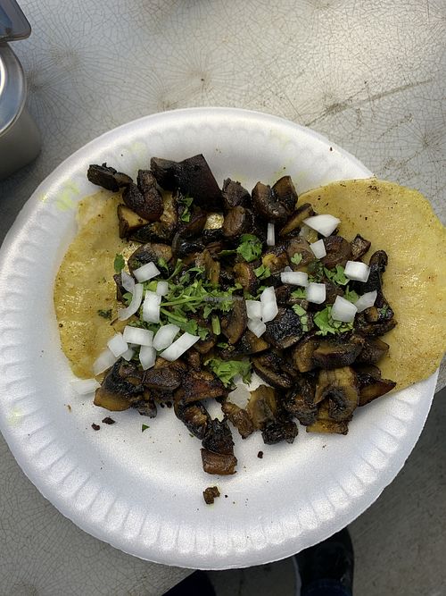 Finished white mushroom tacos with onion and cilantro   at hippiestacos in Long Beach