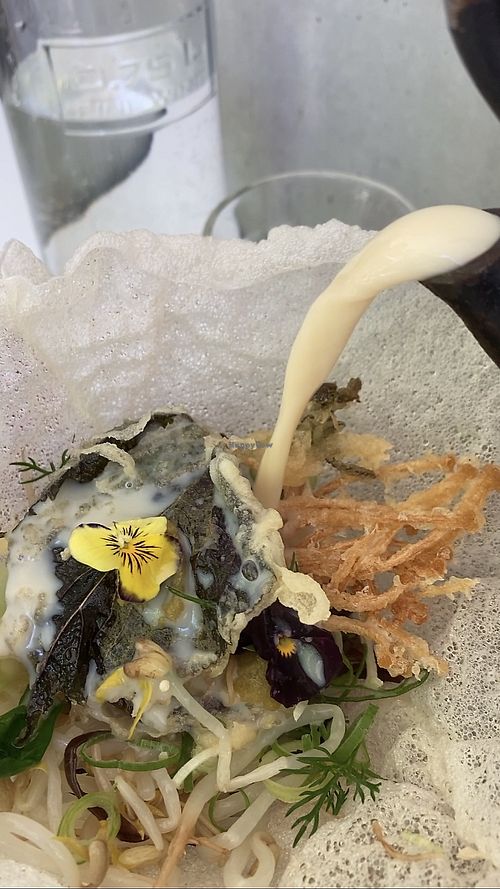 Vegan Ochazuke ( there is a serving of rice under the rice paper basket of veggies. The rice paper basket melts as the hot broth is poured  at Tento in Surry Hills