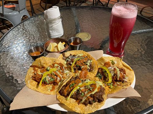 Jamaica drink with a taco order .. spicy and juicy. at El Comal Chilango in Santiago