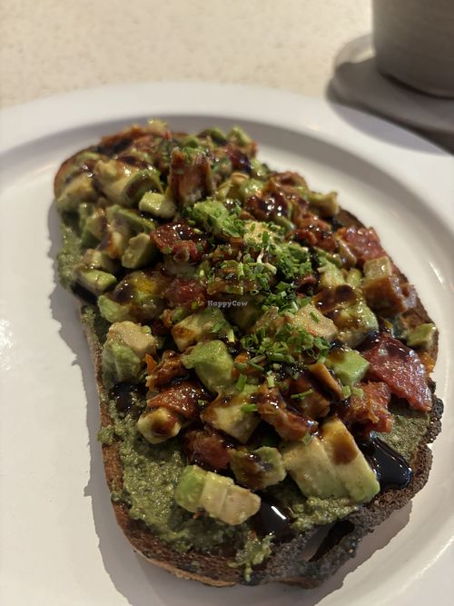 Toast w avocado and sundried tomatoes   at Nueza in Buenos Aires