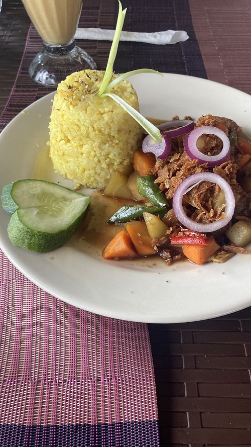 Vegan adobo with rice  at Villa Potenciana Restaurant in Malapascua Island