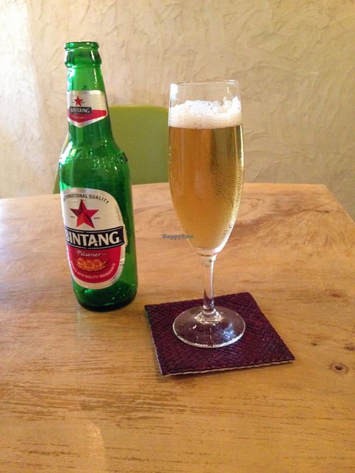 Beer is served in a champagne glass, why not! at Morpho Cafe in Kyoto