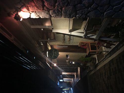 Morpho Cafe Entrance at night at Morpho Cafe in Kyoto