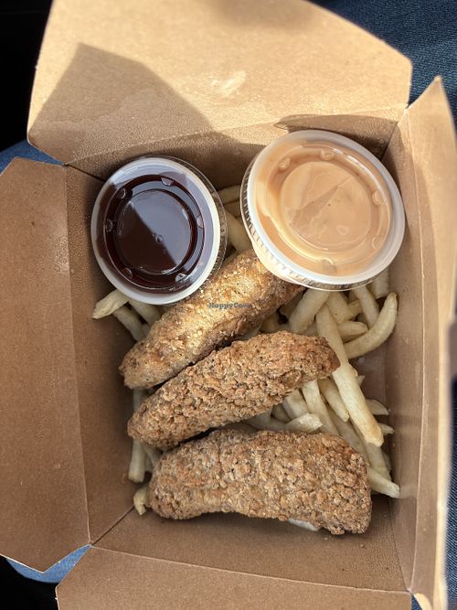 Chicken tenders with fries and dipping sauces  at Lucky Goose  in Albuquerque