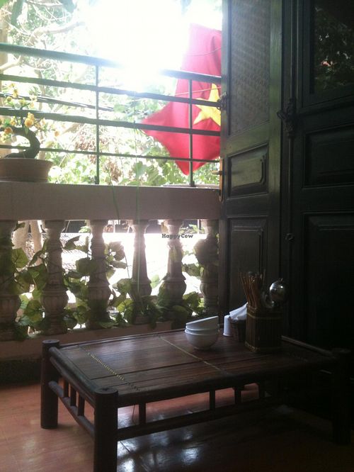 Second floor has a nice balcony, green, and still quiet because the restaurant is located in an alley. at An Phuc in Hanoi