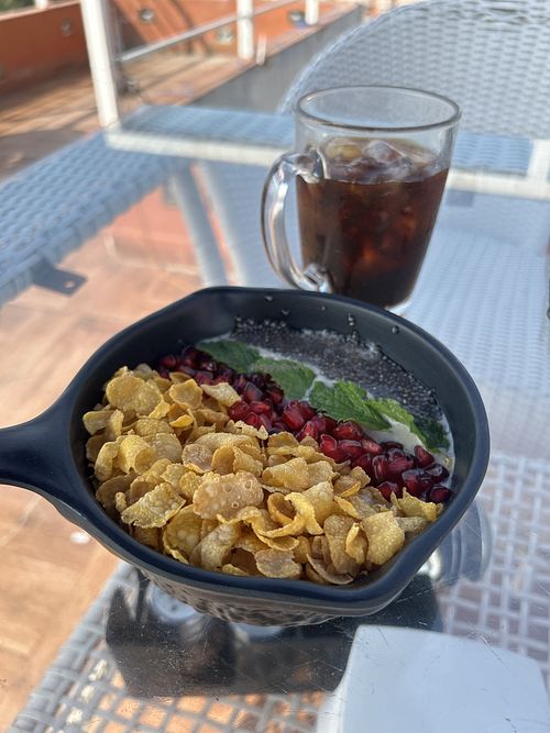 Smoothie bowl and iced americano  at The Tattoo Cafe and Lounge in Jaipur