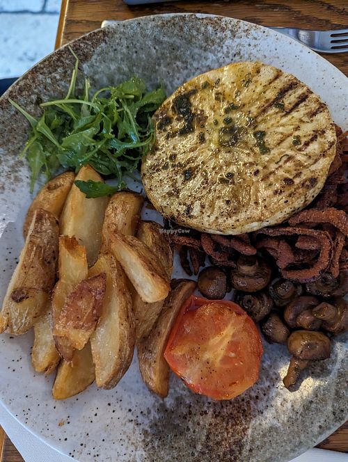 Vegan celeriac steak plus sides including tobacco onions at The Snooty Tavern in St Neots
