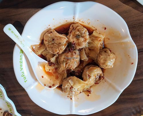 Wontons in house special sauce at Tofu Vegan - Spitalfields in East London