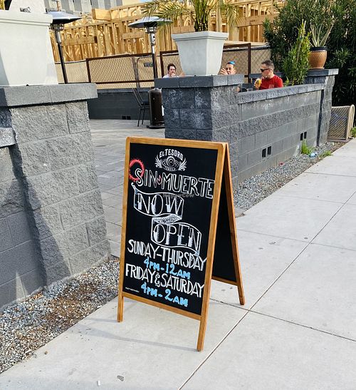 Sign outside and patio   at Sin Muerte in Phoenix