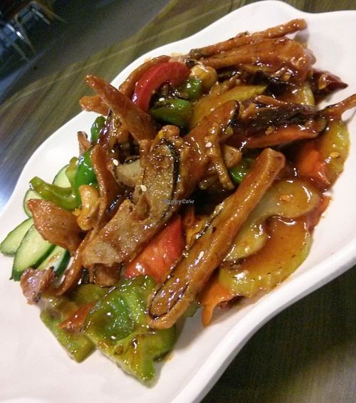 Spicy fish.  Sweet sauce with some chilli, cashews and very thin, crispy fried pieces of mock fish. at Su Life Vegetarian Restaurant in Upper Mount Gravatt
