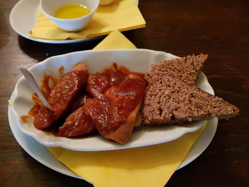 Tempeh 'sausage' and curry sauce at Vaust Braugaststatte in Berlin