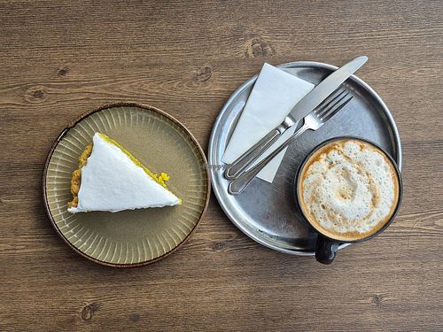 Good cake with nice vegan cream. Coffee was particulated though, probably because of the milk. at Veggy Delivery in Ankara