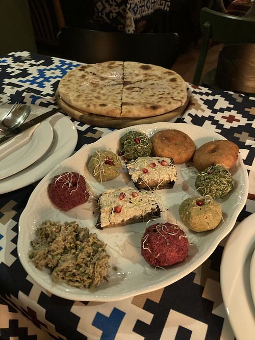 Vegan starter plate (front), lobiani (back)  at Ambavi Berlin in Berlin