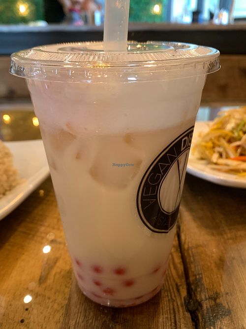 Jasmine green milk tea with rep popping boba pearks at Vegan District Asian Eatery in Loma Linda