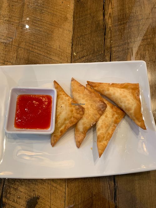 Cheese wontons with sweet and sour sauce at Vegan District Asian Eatery in Loma Linda