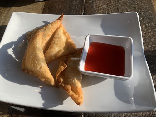 Cheese wonton with sweet and sour sauce   at Vegan District Asian Eatery in Loma Linda