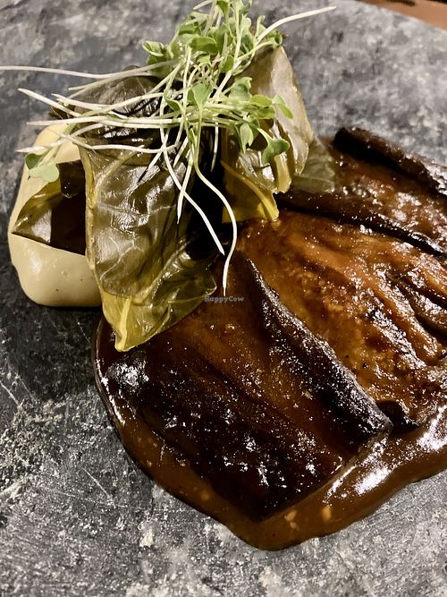 Berinjela e angu de milho com couve manteiga fermentada  at Conca Cozinha Original in Brasilia