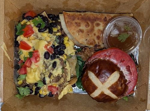 Sampler box: nachos, jackfruit birria taco, and fried chick'n slider at PHAT Vegan in Fort Washington