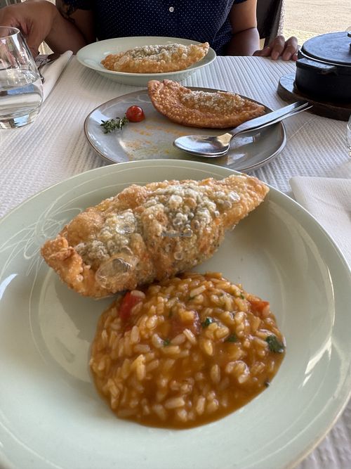 Three pies in one order alongside a cauldron of piping hot tomato ricee  at Belém 2 a 8 in Lisbon