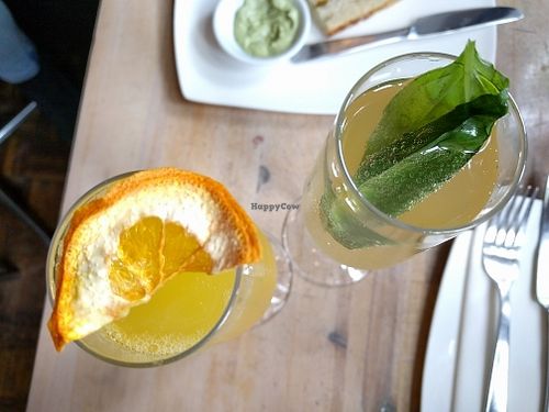 Mimosa and a strawberry cocktail at The Acorn in Vancouver