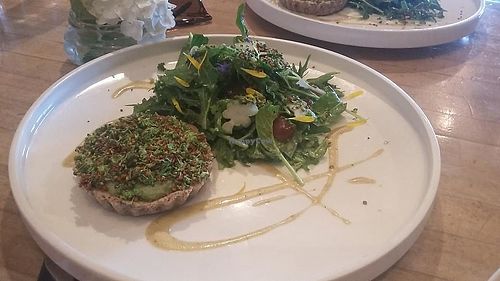 Raw Hazelnut + Almond Tart, Broccoli + Cashew Puree, Sprouted Quinoa, Spring Greens, Celery Vinaigrette, Pickled Grapes * at The Acorn in Vancouver