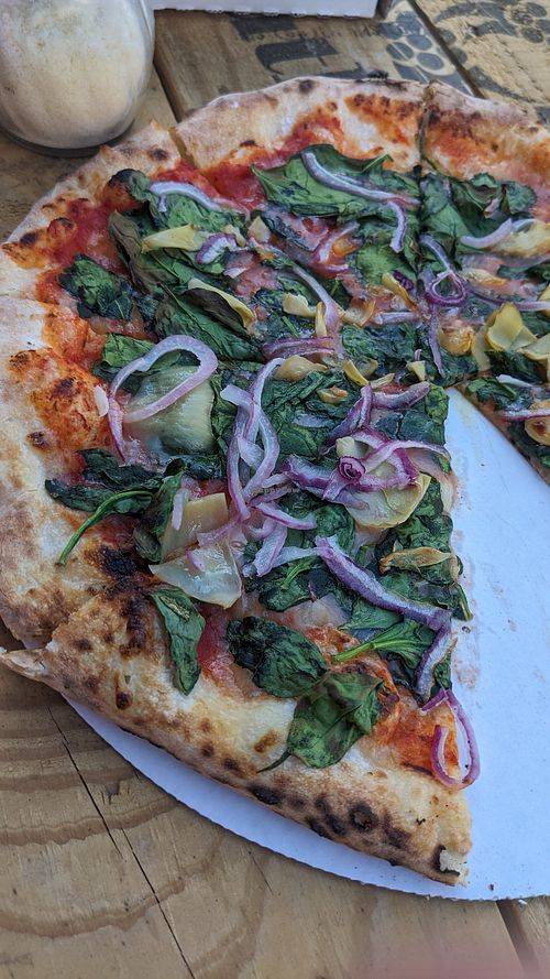 The 12-inch veggie pizza with nondairy cheese. at Doughbaby - Pop-up in Lakeport