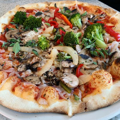 Wood roasted vegetable pizza with vegan cheese.  at Brixx Wood Fired Pizza - Birkdale in Charlotte