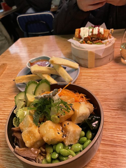 From top: bao bun, tofu chips, sushi bowl    at Ditto in Te Anau