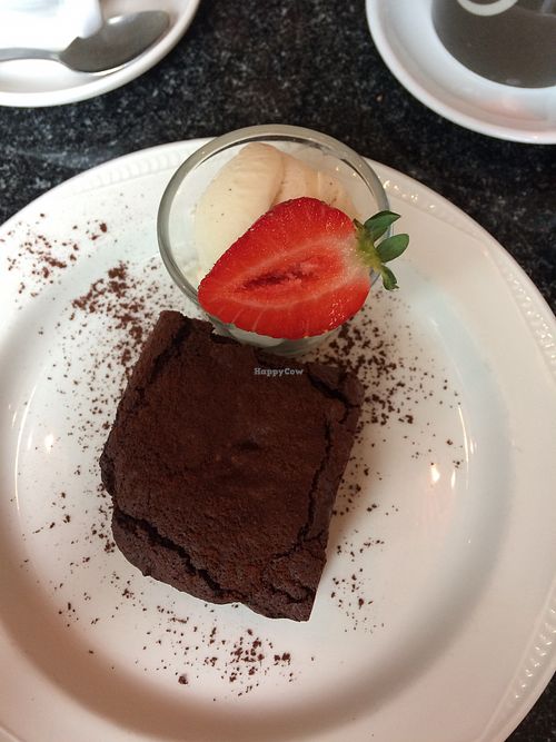Chocolate brownie and vegan ice cream  at Greens Cafe in Grasmere