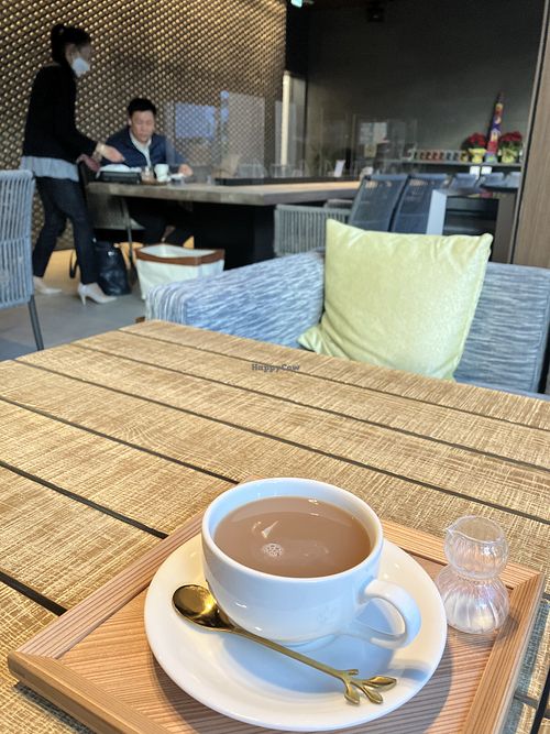 Sofa with soy milk tea  at Oike Cafe in Kyoto