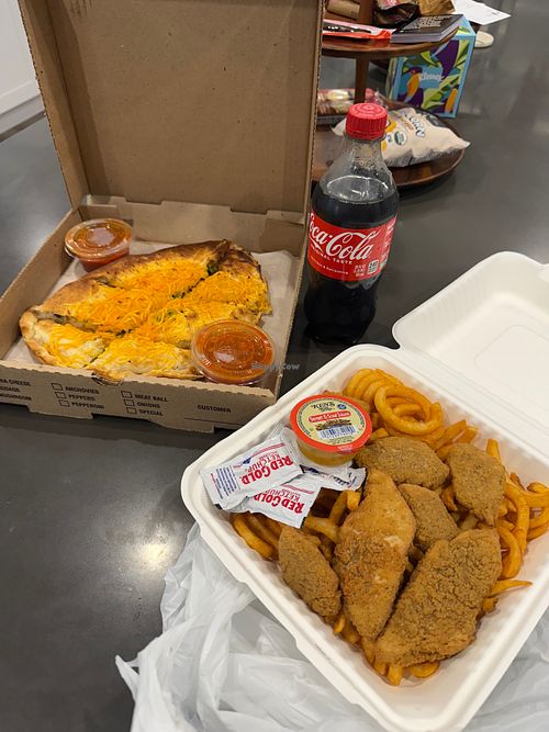 Vegan veggie calzone and vegan tender special at Parrot Pizza Worcester in Worcester